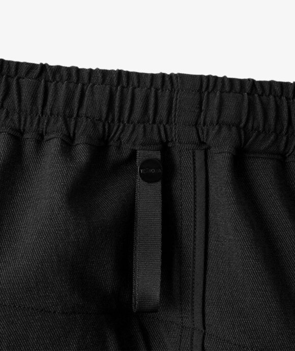 TEÄTORA - Wallet Pants HOTEL GHOST CODE